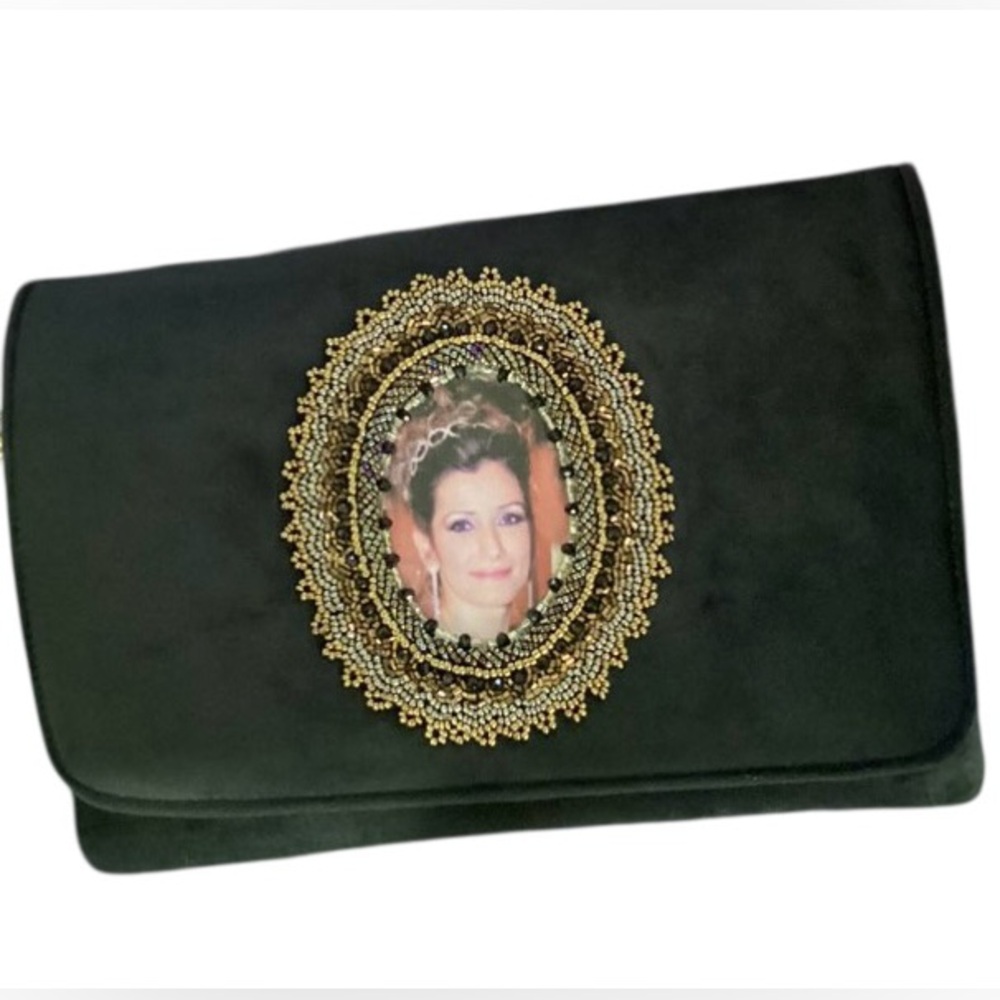 Elegant Black Clutch with Gold Embellishment
